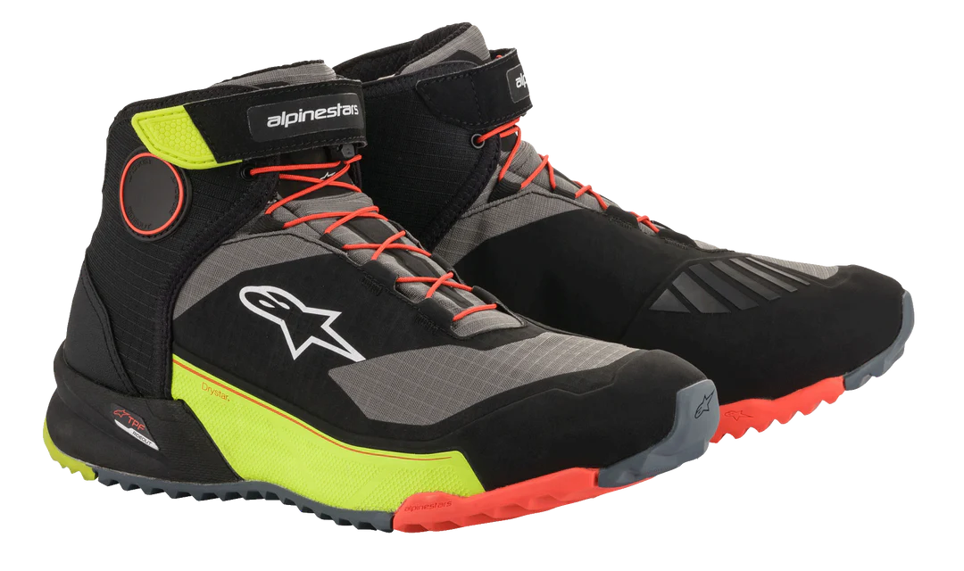 Alpinestars CR-X Drystar motorcycle riding shoes in black, grey, fluorescent yellow, and red with lace-up and Velcro closure.
