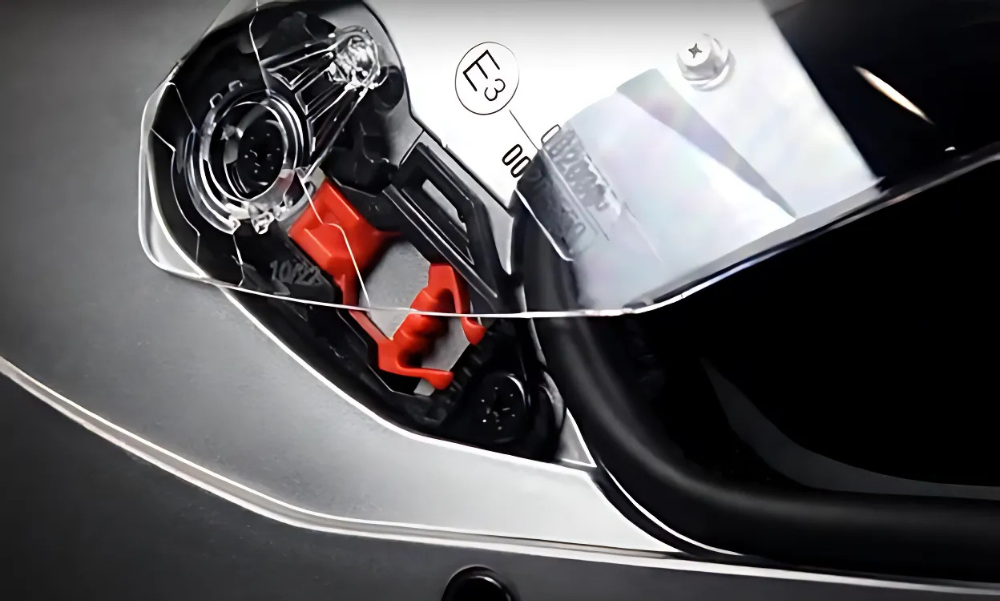 Close-up of AGV K3 visor seal mechanism showing hollow rubber gasket