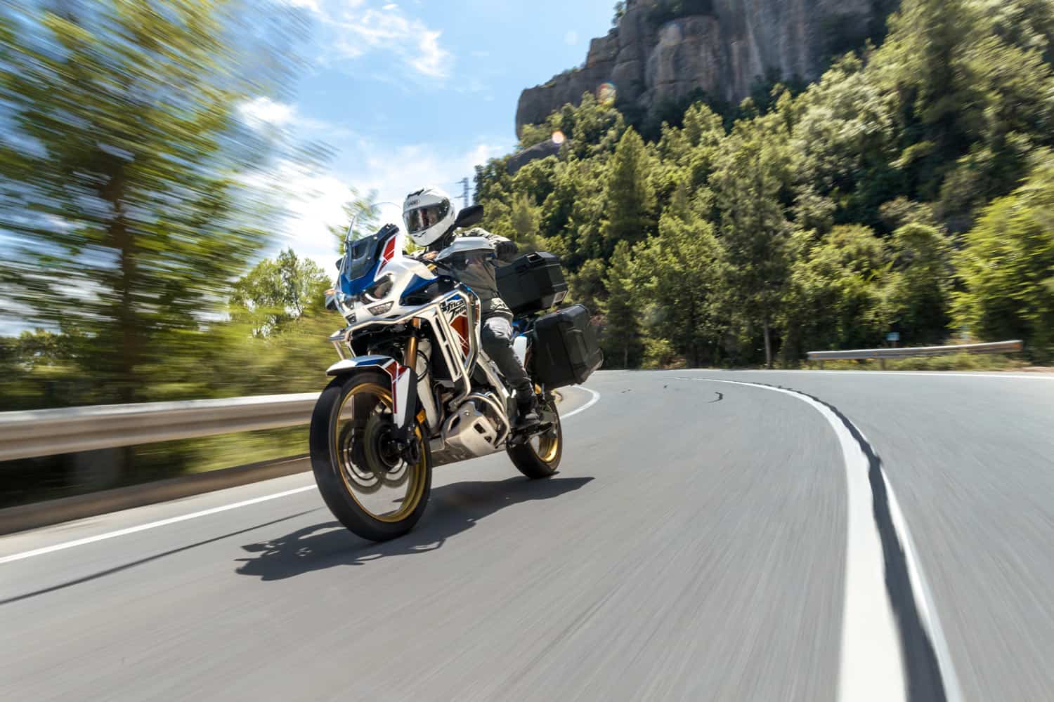 Rider wearing Shoei GT-Air 3 helmet cruising on open road