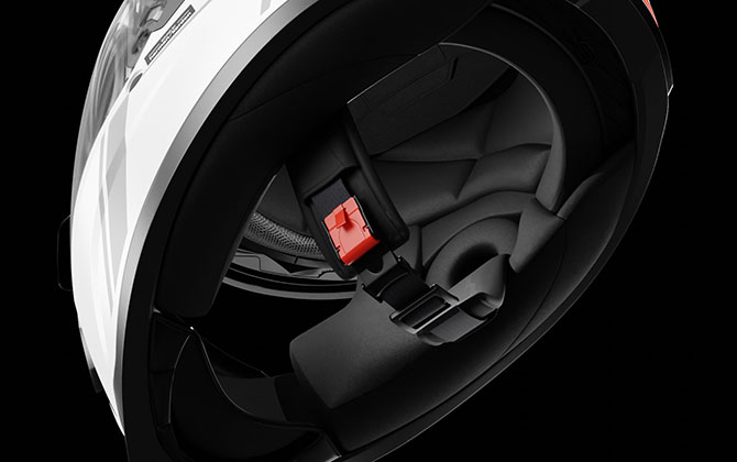 Interior view of the Sena Stryker helmet showing ratcheted chin strap and padded liner