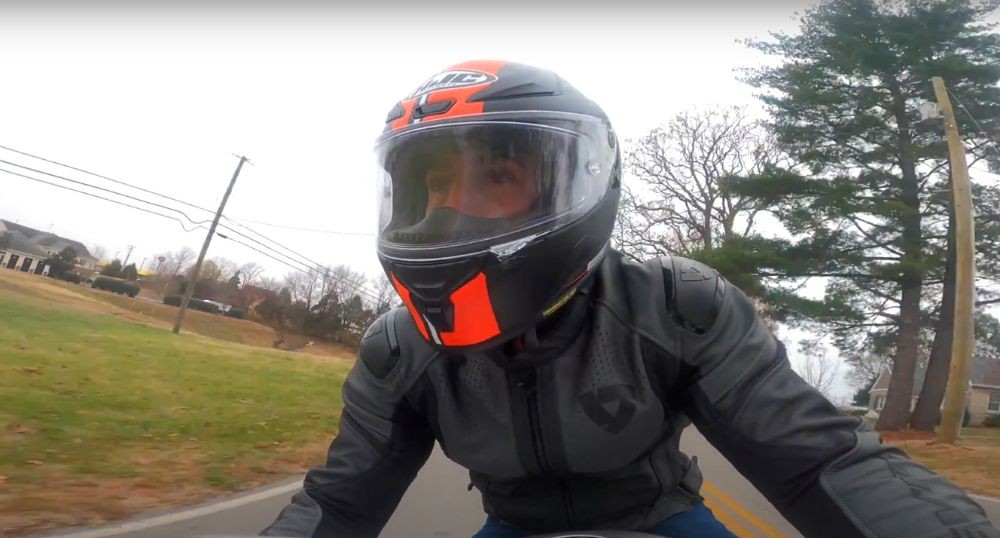 Motorcyclist wearing the HJC RPHA 1N helmet during a test ride