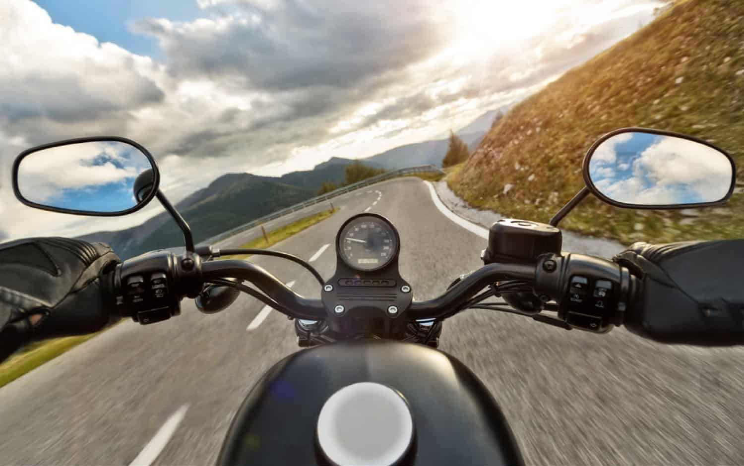 POV motorcycle ride through mountain road at sunset, perfect for testing action or 360 cameras