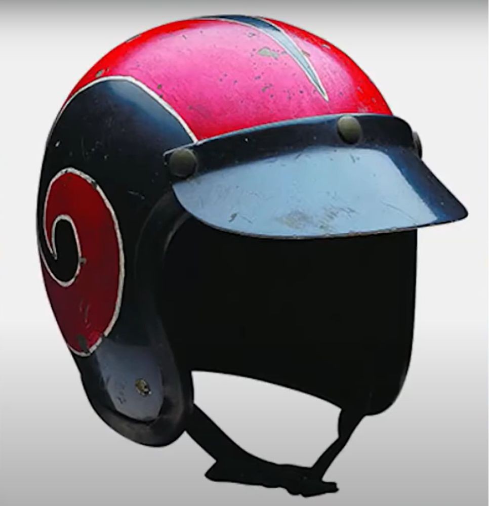 Vintage red and black Bell open-face helmet with visor