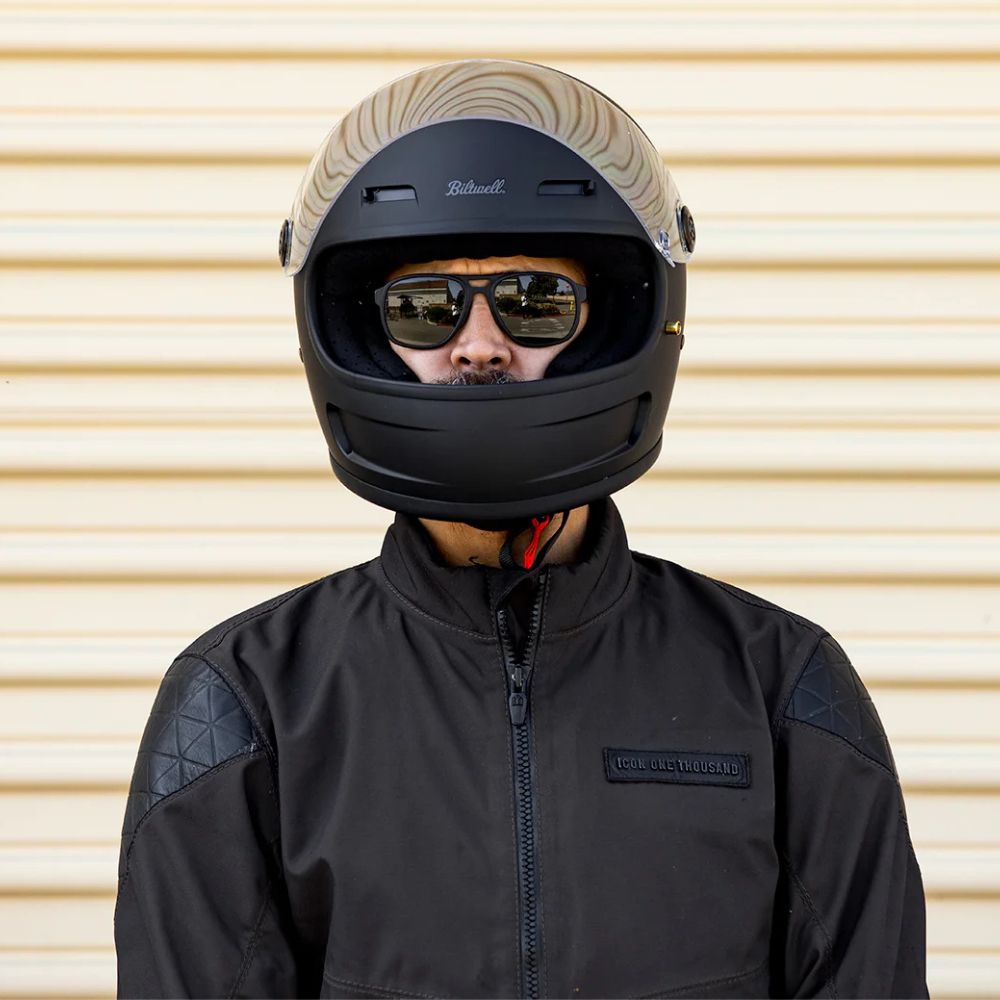 Rider facing forward wearing a Biltwell Gringo SV helmet and sunglasses