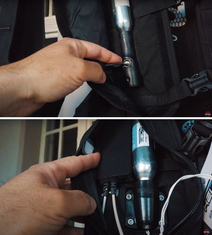 Side-by-side comparison of mechanical and electronic Helite vest cartridges showing the trigger and control components