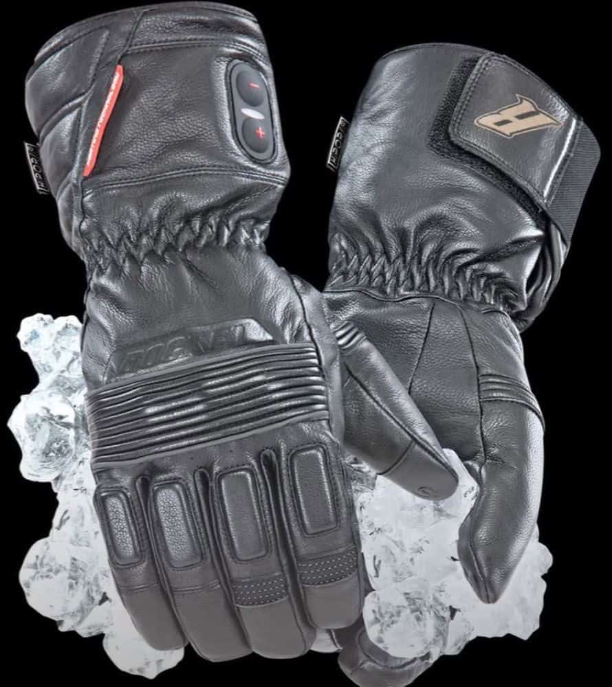 Pair of black leather heated motorcycle gloves with control buttons and LED indicators on cuffs, designed for warmth and protection.
