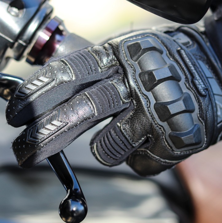 Rider wearing Scorpion EXO Klaw II Gloves with perforated leather and knuckle armor