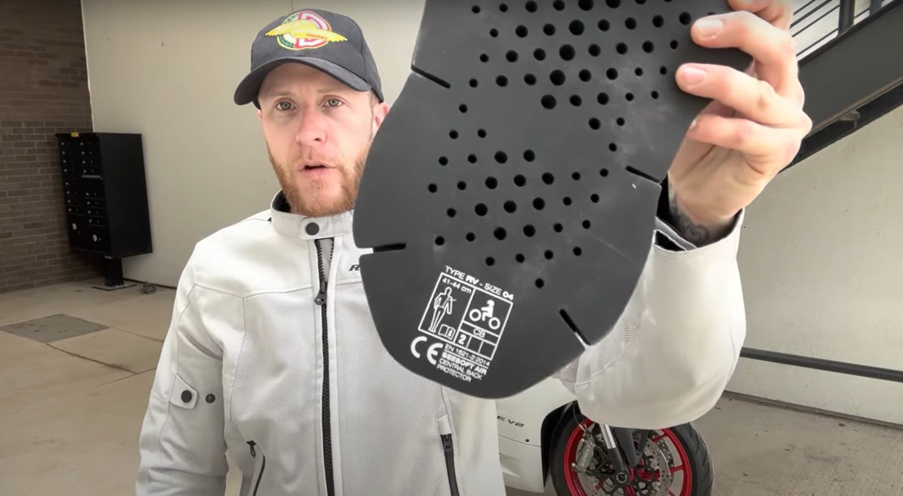 CE-Level 2 SEESOFT back protector shown up close in rider's hand