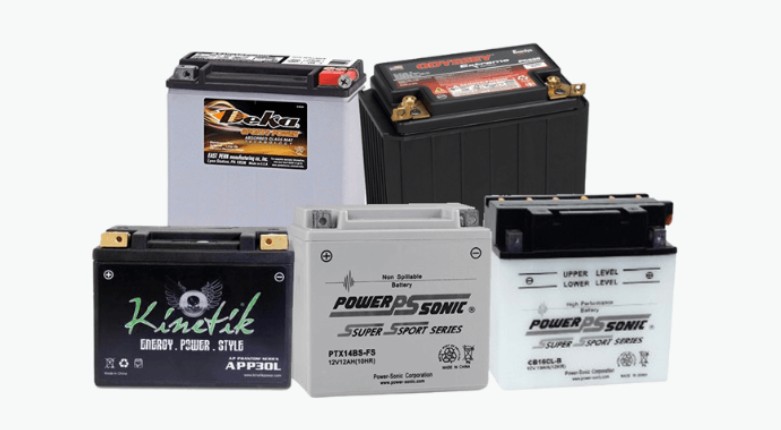 Five different motorcycle batteries showing various types, including sealed, AGM, and flooded lead-acid designs.