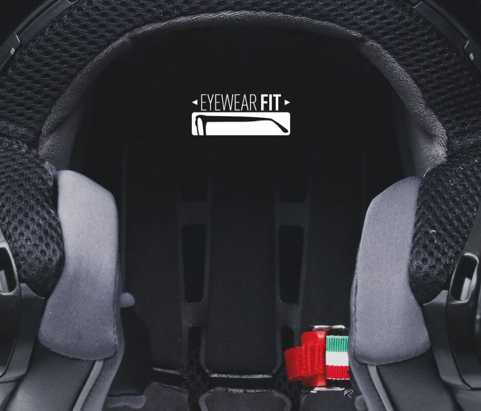 Close-up of helmet interior showing padded eyewear channels labeled "Eyewear Fit" for glasses compatibility