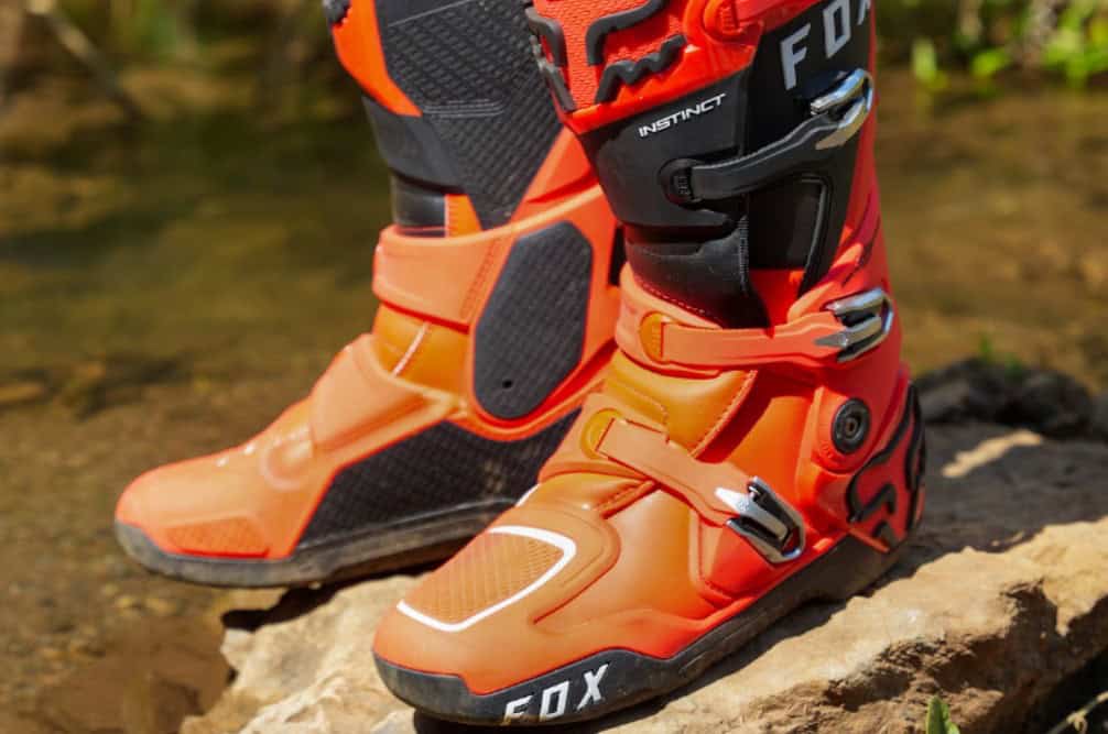 Close-up of Fox Instinct motocross boots showing a slim toe box and articulated design for improved control and rider feedback.