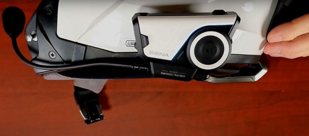 Sena 60S mounted on a helmet using the magnetic clamp system