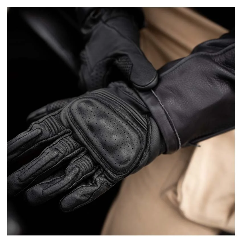 Close-up of REV'IT! Monster 3 short-cuff leather motorcycle gloves with knuckle protection