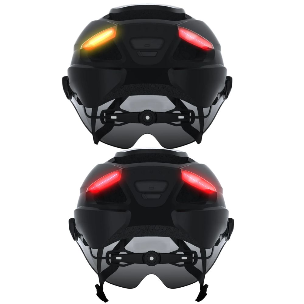Rear view of helmet showing turn signal light on top and brake lights below, both illuminated
