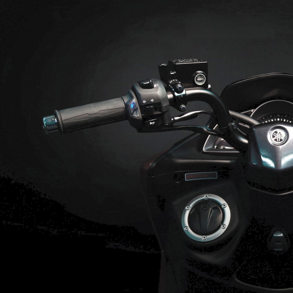 Koso Apollo heated motorcycle grips installed on Yamaha handlebar