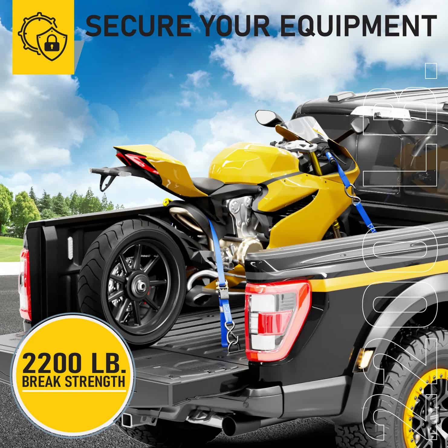 Yellow motorcycle secured with blue AUGO ratchet straps in the bed of a black pickup truck