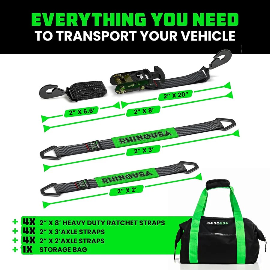 Rhino USA Heavy Duty Vehicle Tie Down Kit with ratchets, axle straps, and a green-handled storage bag