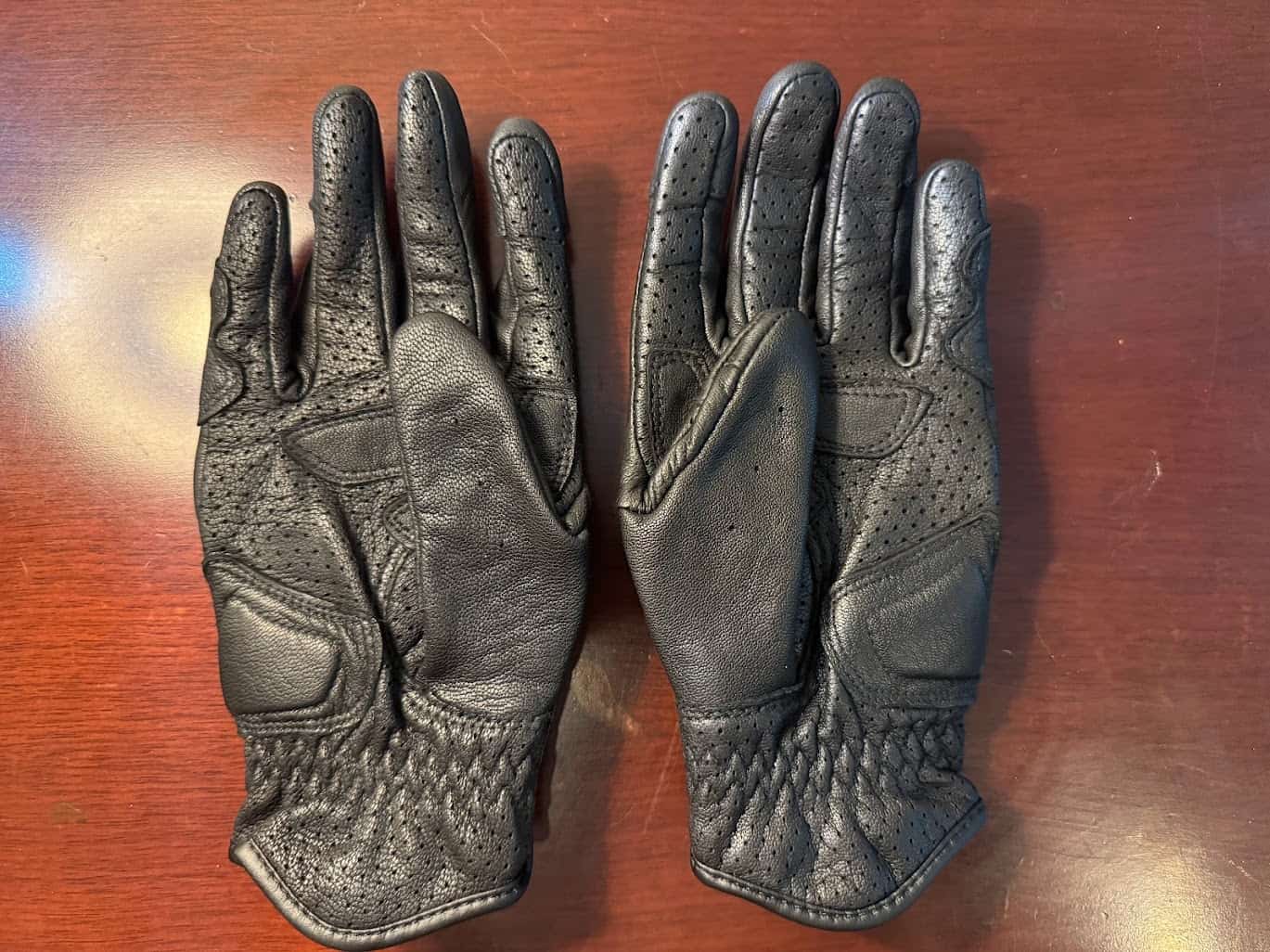 Close-up of palm-side view of Pando Moto Ivy Gloves showing perforations and padding