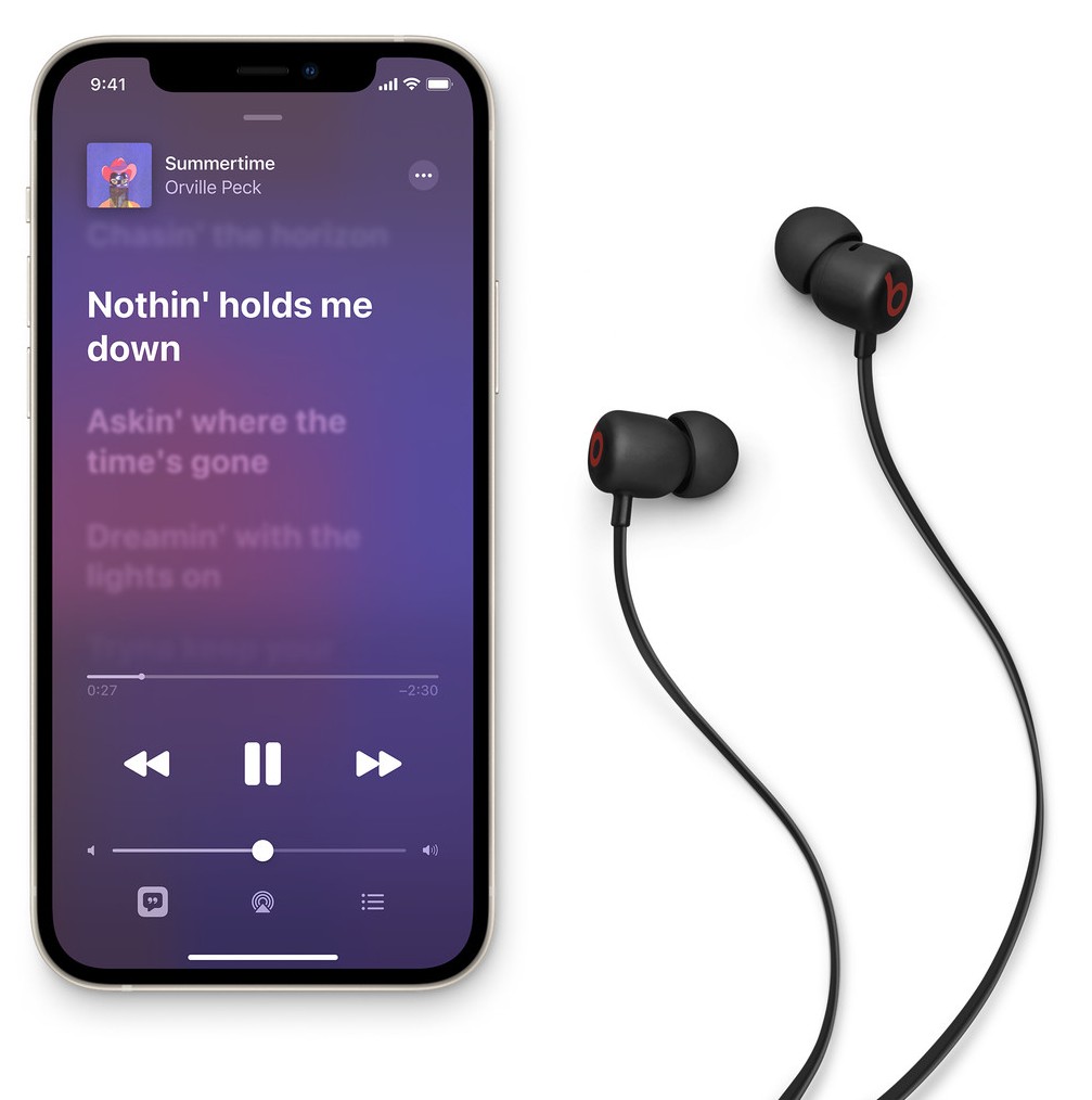 Beats Flex wireless neckband earphones shown beside an iPhone playing music, ideal for riders seeking control and security.