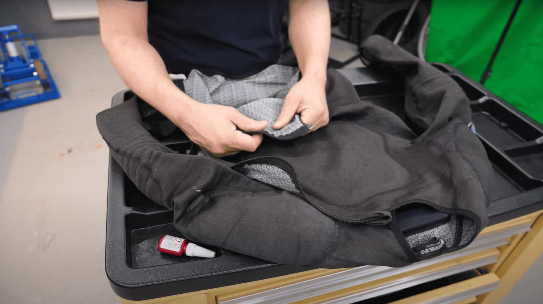 Close-up of Adventure Spec Supershirt 2.0 fabric showing smooth, stretchy, single-material construction