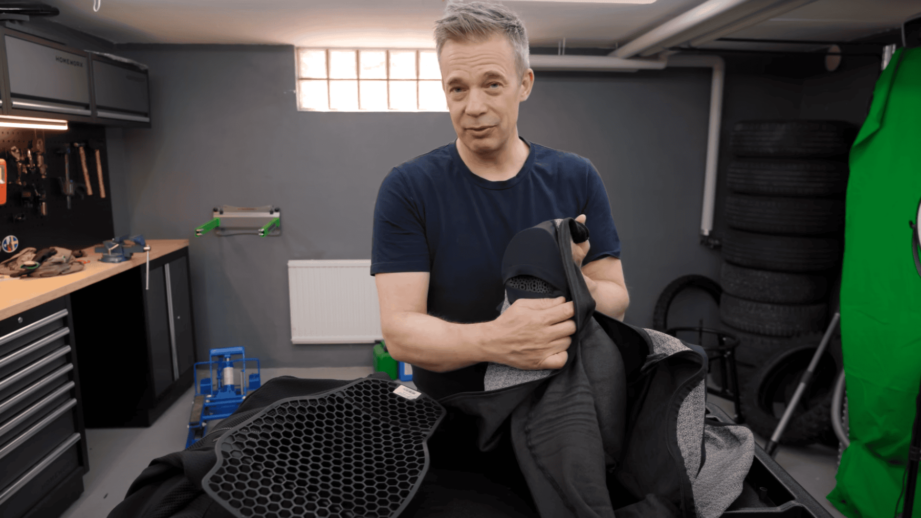 Demonstration of pad pocket placement on Adventure Spec Supershirt 2.0 highlighting potential snag points