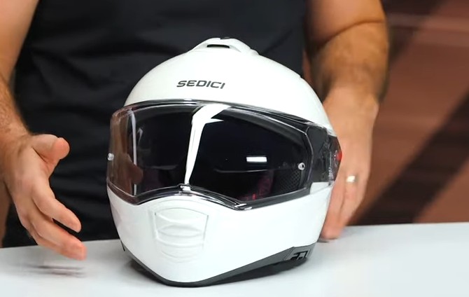 Sedici Sistema 3 modular helmet shown on table with visor down