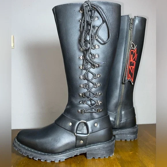 Z1R Women’s Savage black leather motorcycle boots with 16-inch shaft, harness straps, side zipper, and rugged lug soles, shown upright.