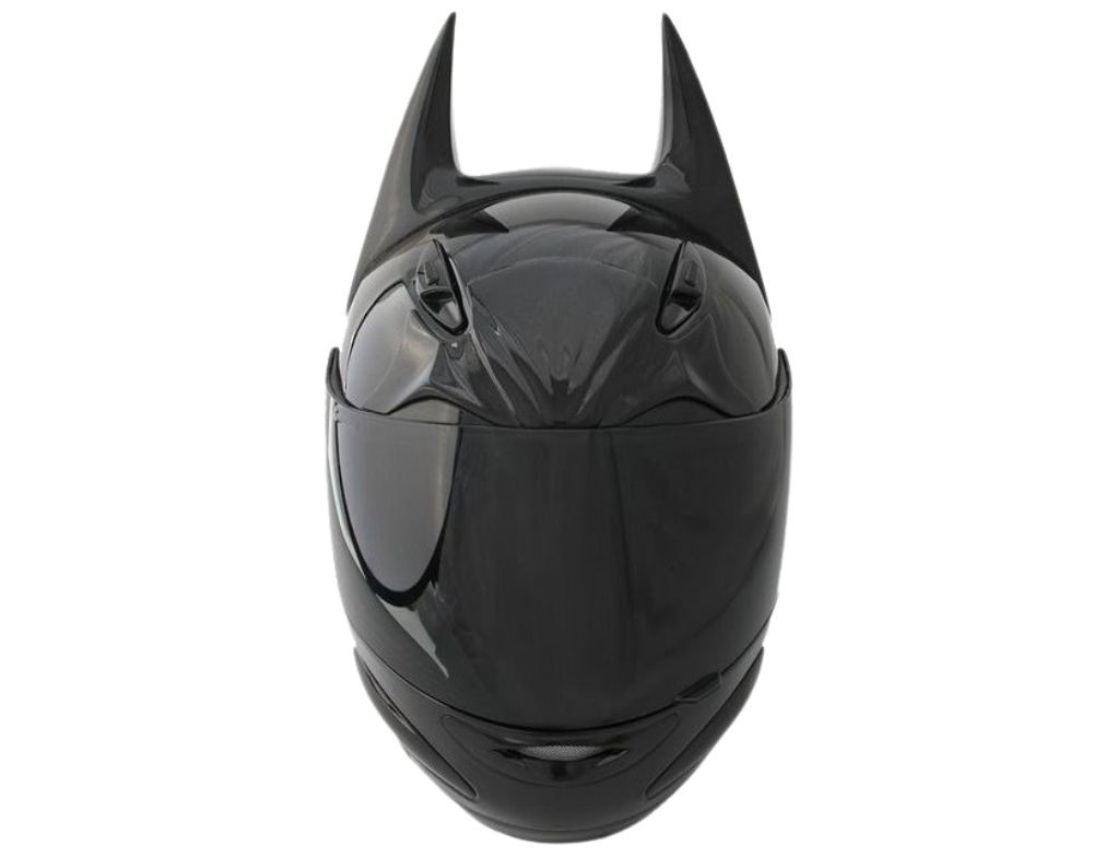 Custom black motorcycle helmet with bat ears inspired by Batman, photographed front-facing on a transparent background.