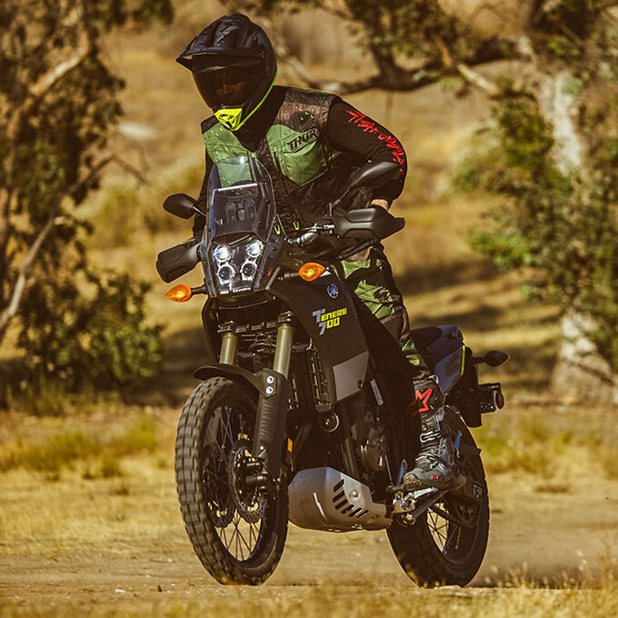 Rider wearing Bell MX-9 Adventure MIPS helmet on a Yamaha Ténéré 700, navigating dirt terrain