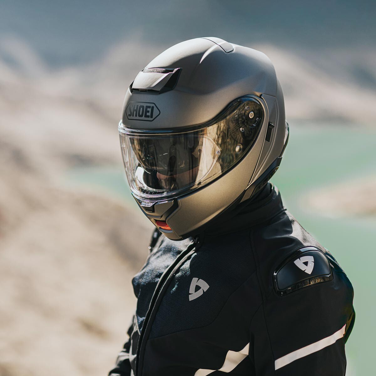 Shoei Neotec 3 modular helmet worn by rider in touring gear