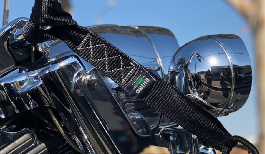 Rhino USA soft loop tie down strap securing a motorcycle handlebar without metal contact