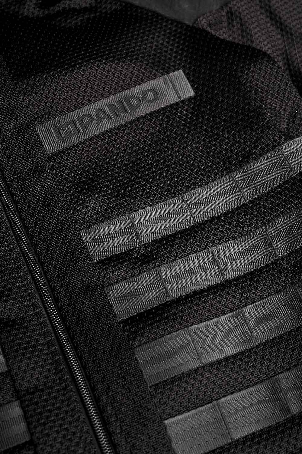 Close-up of Pando Moto Commando jacket mesh construction designed for airflow and heat dissipation during hot-weather riding.