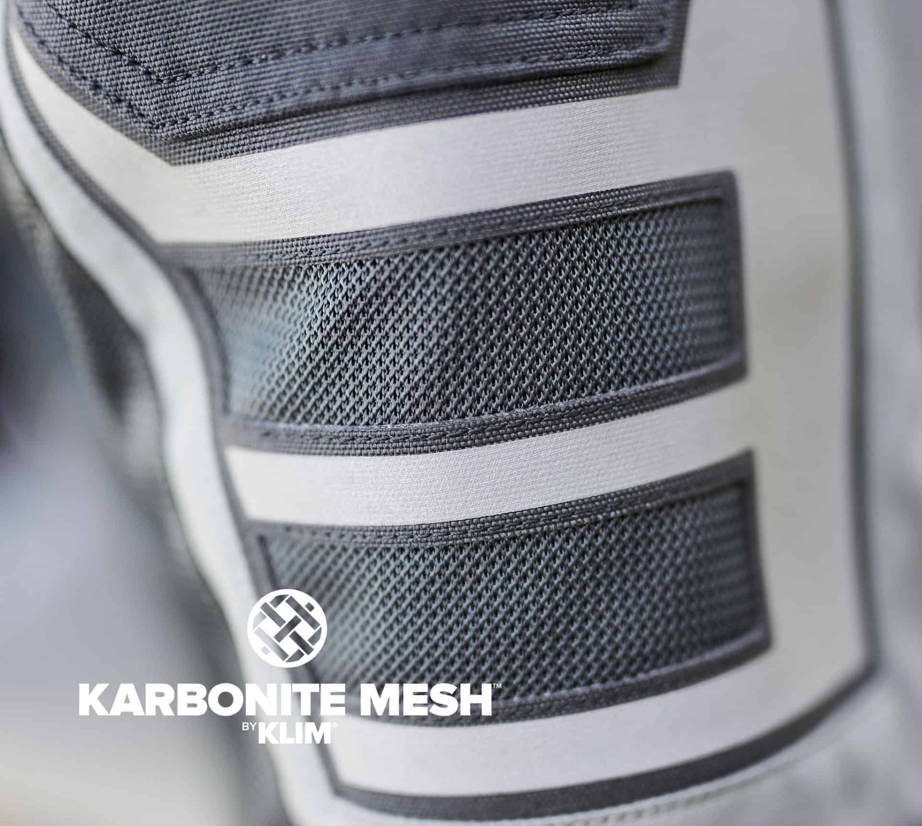 Close-up of Klim Induction Pro jacket Karbonite mesh with reflective panels