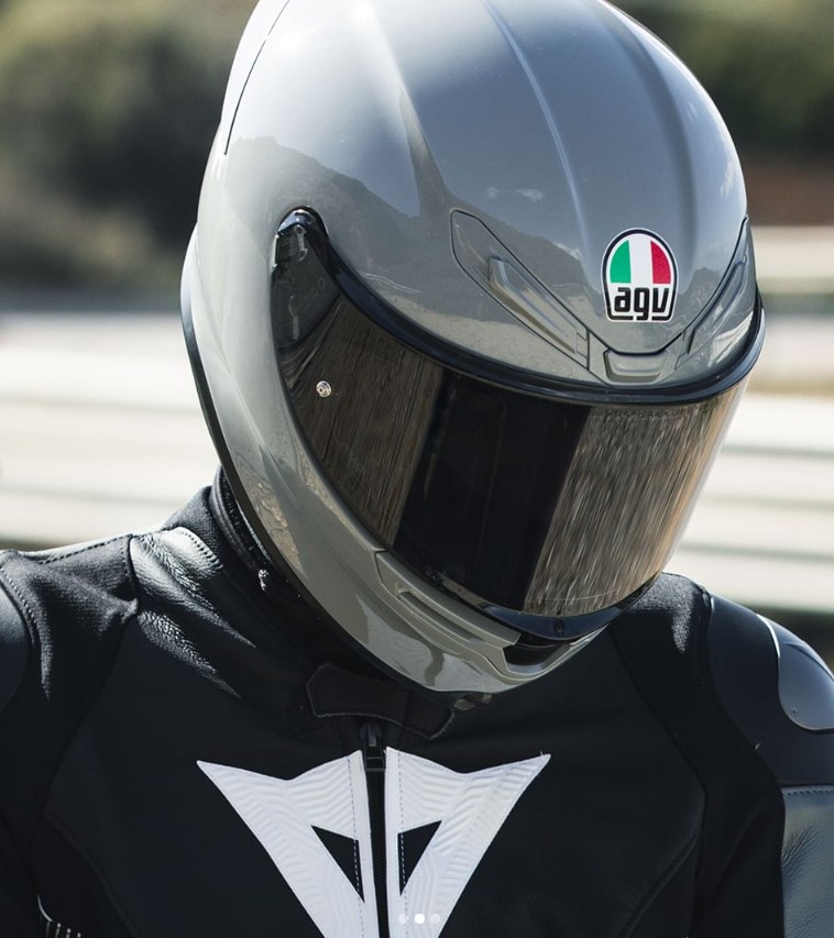 AGV K6 S helmet in gray, lightweight design with wide field of view and ECE 22.06 safety certification.