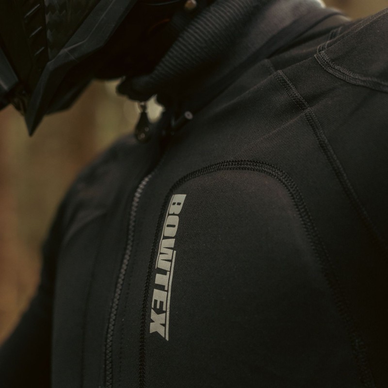 Close-up of Bowtex Elite shirt showing dense Dyneema knit construction designed for abrasion resistance and heat conduction.