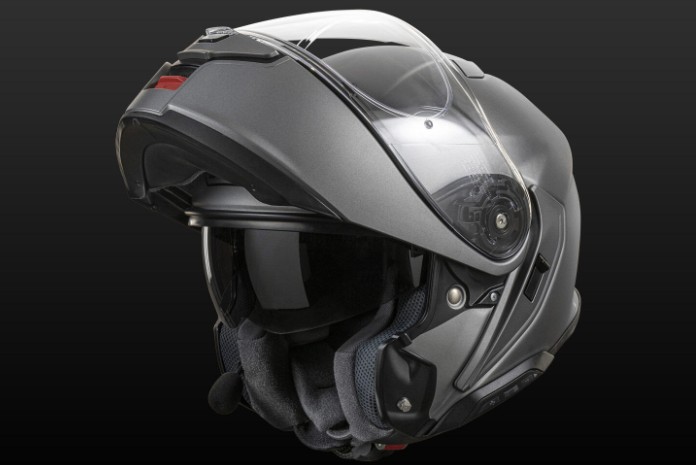 Shoei Neotec 3 modular helmet with chin bar raised, showing sun visor and touring features