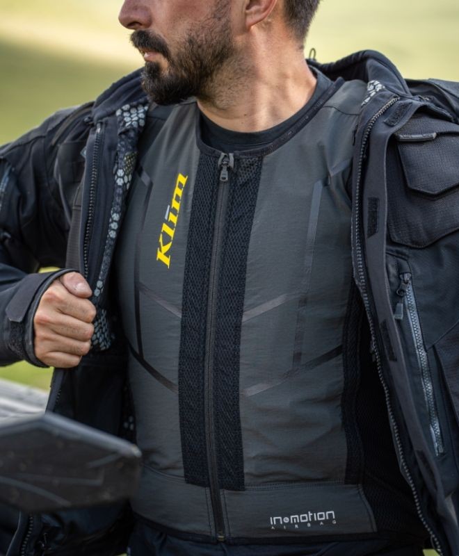 Rider wearing Klim Ai-1 airbag vest under a jacket