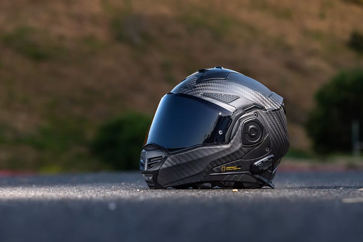 LS2 Advant X Carbon modular helmet with sleek carbon finish on pavement