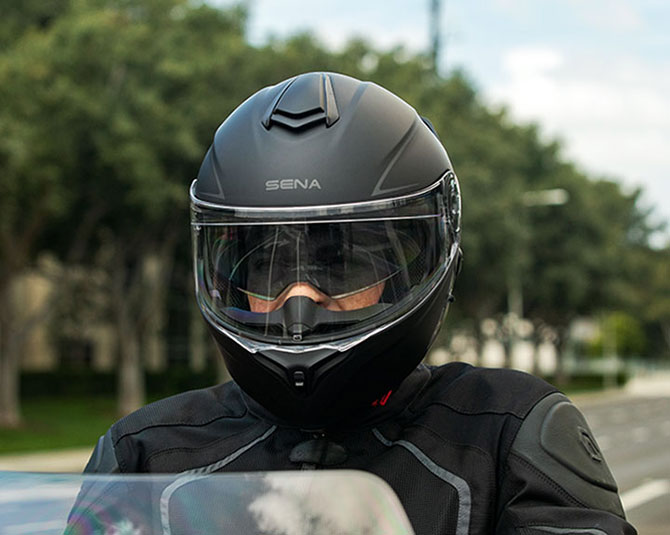 Sena Outrush R modular helmet with built-in Bluetooth system, designed for riders who want communication and convenience in one package.