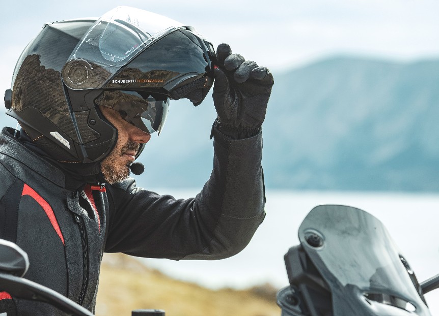 Schuberth C5 Carbon modular motorcycle helmet with visor lifted, designed for quiet touring comfort