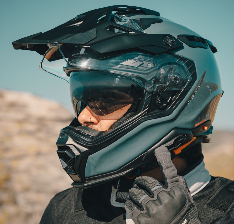 Close-up of rider wearing Nexx X.WED3 helmet with integrated comms-ready design and sun visor