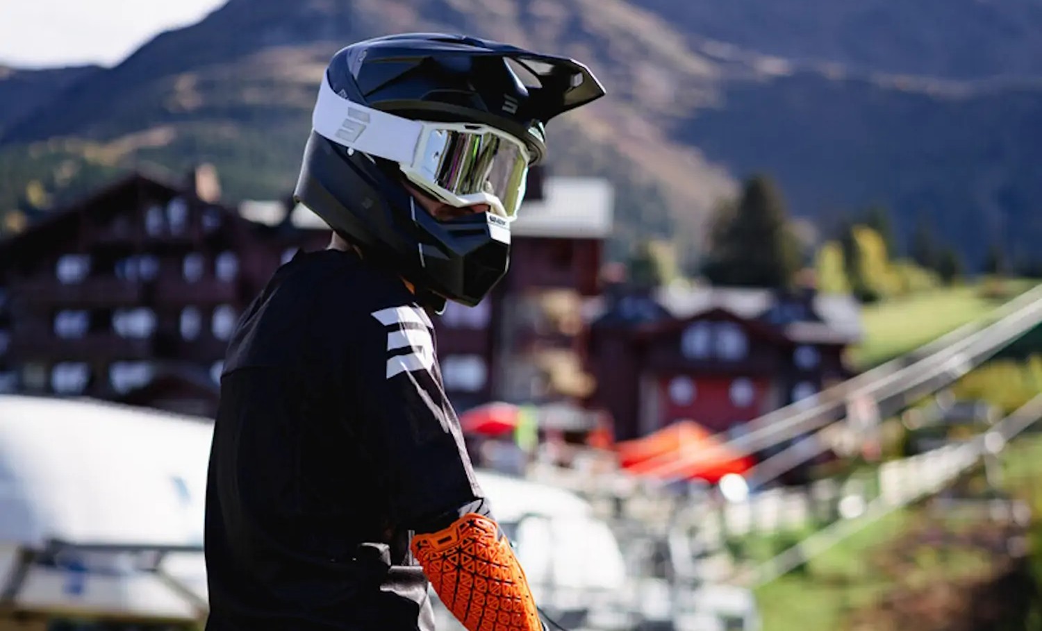 Rider wearing Shot Iris 2.0 Tech motocross goggles with iridium lens and triple-density foam for comfort