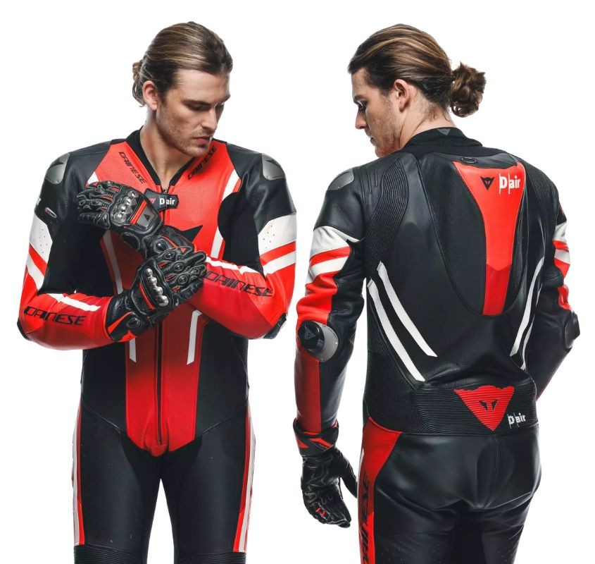 Front and back view of the Dainese Misano 3 D-Air race suit showing integrated airbag zones, titanium sliders, and ergonomic stretch panels.