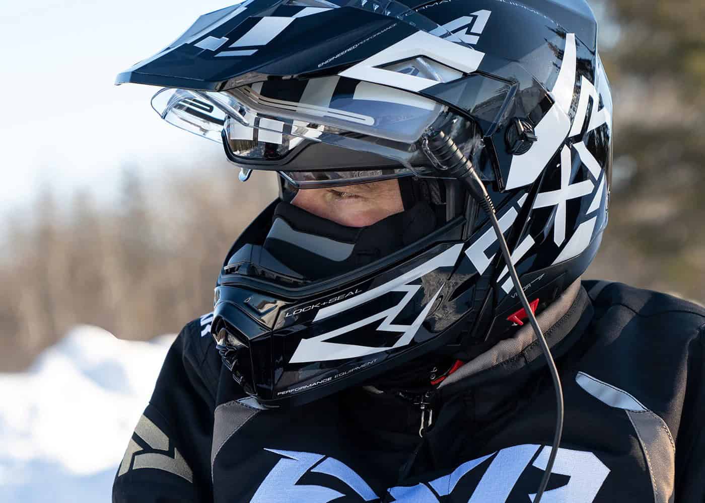 Rider wearing FXR Maverick X Modular Helmet with heated visor