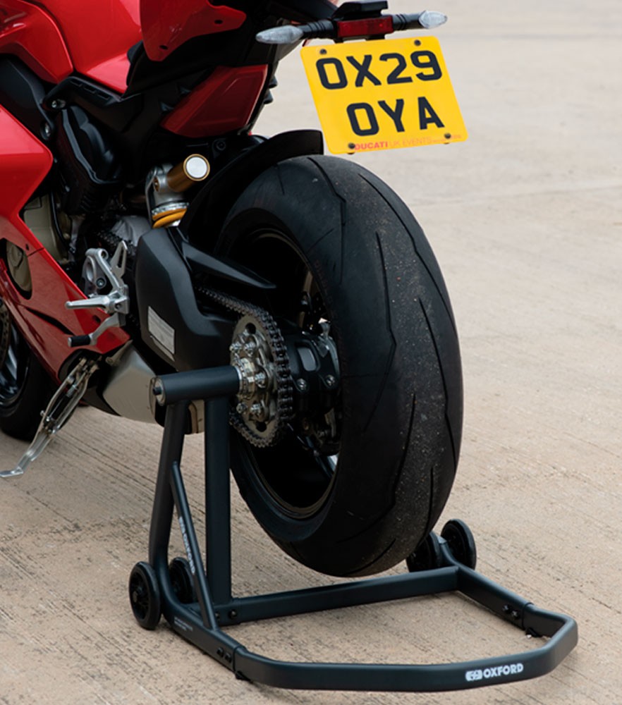 Oxford Zero-G Single Sided Stand supporting a Ducati’s rear wheel for maintenance