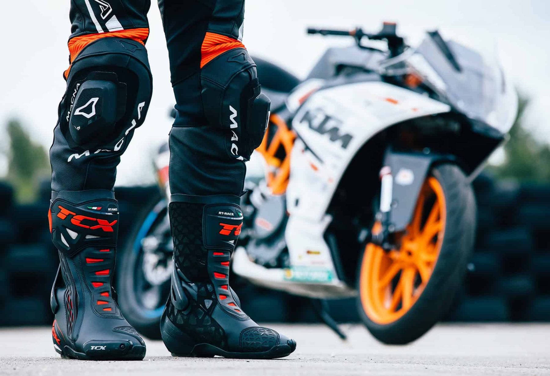 TCX RT-Race motorcycle boots — mid-range racing boots with DFC ankle support and a secure lacing system for confident control.