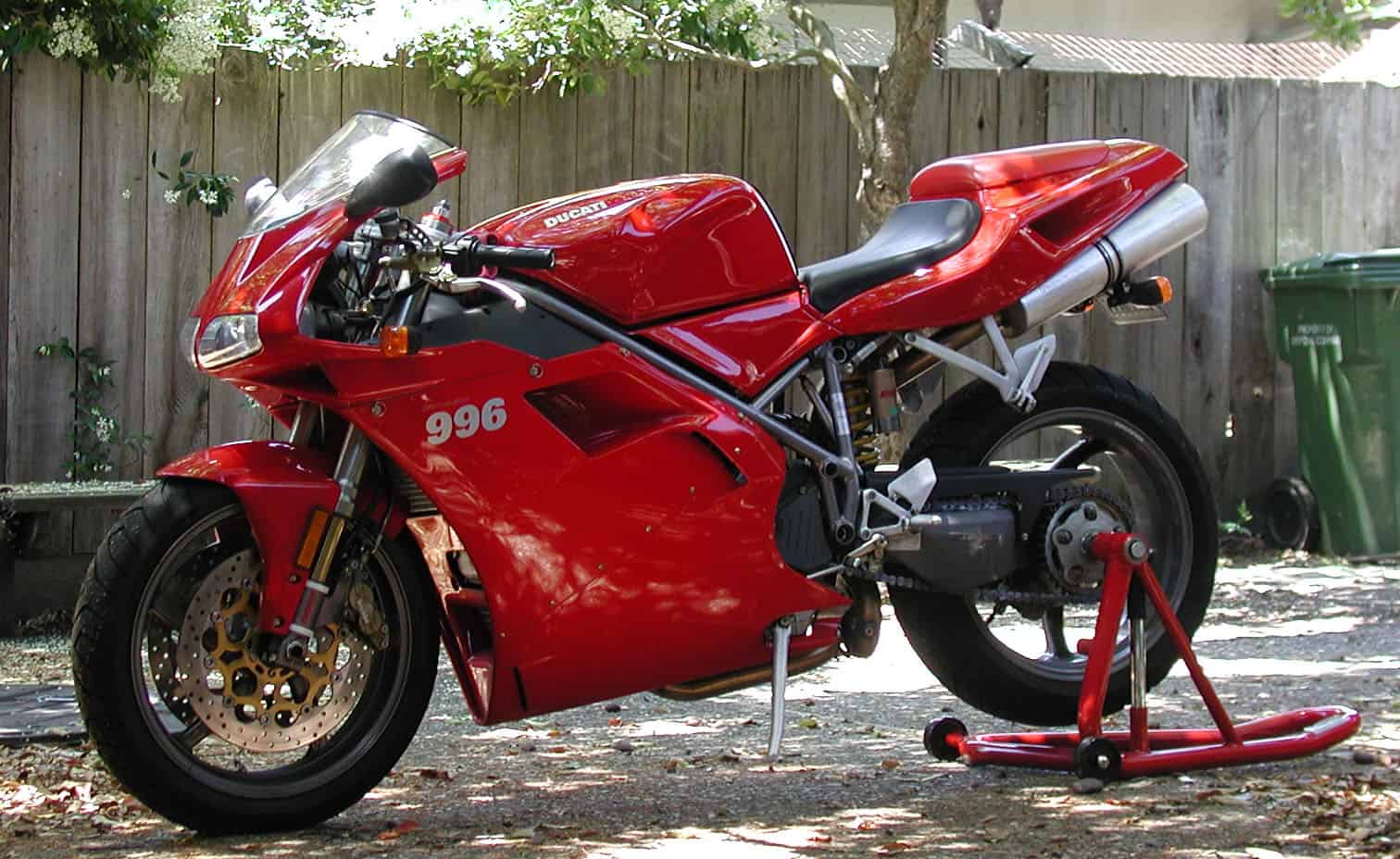 Ducati 996 sportbike parked outdoors, showcasing its race-inspired design and performance heritage