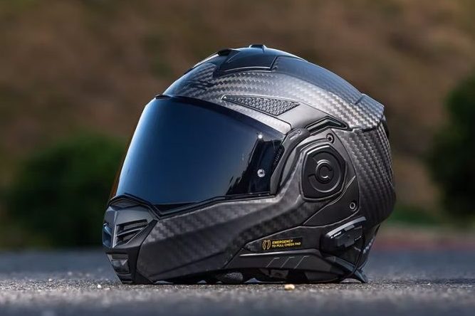 LS2 Advant X Carbon modular helmet with sleek carbon finish on pavement