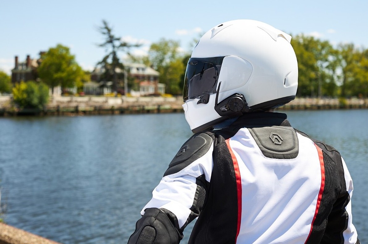 Rider wearing REAX Apex Pro Mesh Jacket by the water