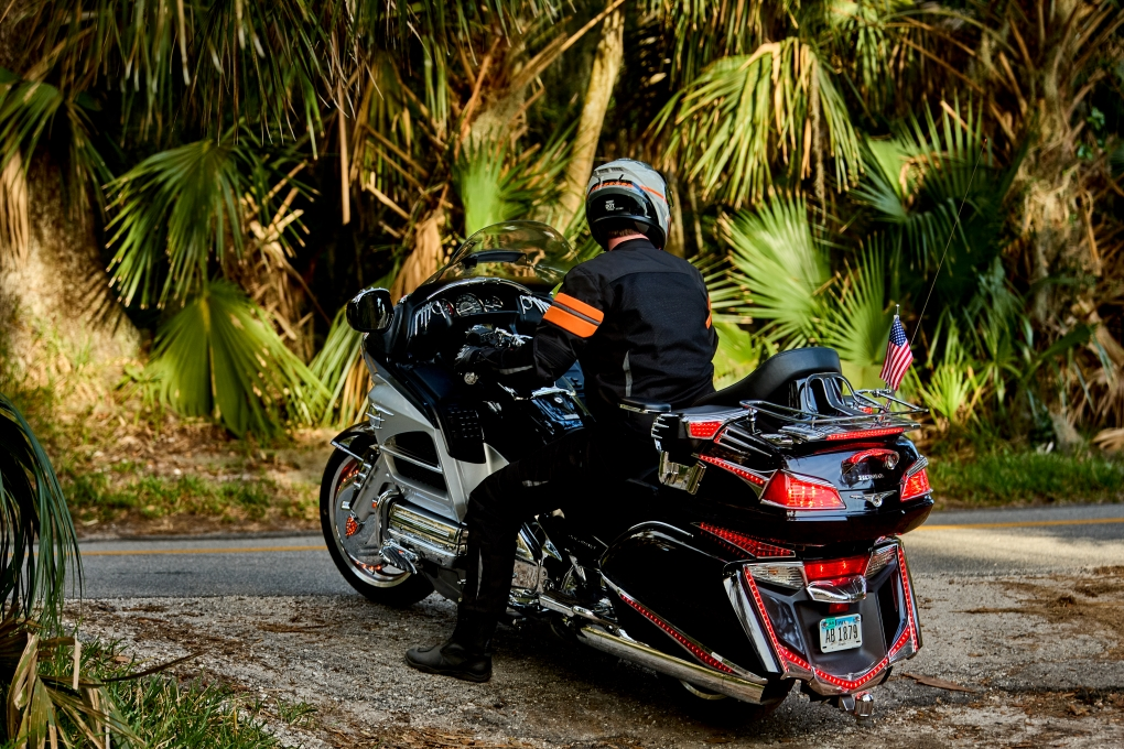 Rider wearing BILT Blaze 3 jacket on a touring motorcycle